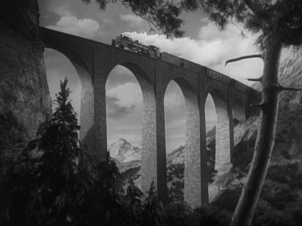 The Lady Vanishes - Alfred Hitchcock - bridge - train