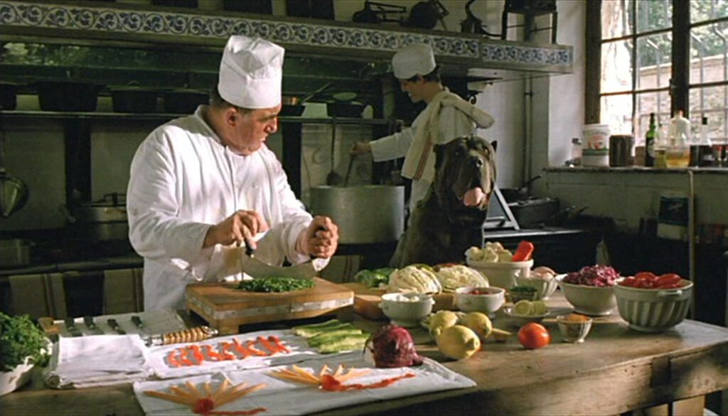 Roselyne and the Lions - Roselyne et les lions - Jean-Jacques Beineix - chefs - dog - stool - chair - table - hotel kitchen