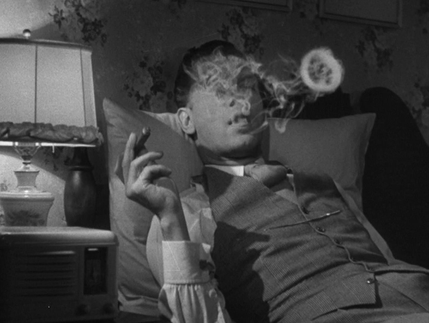 Shadow of a Doubt - Alfred Hitchcock - Uncle Charlie - Joseph Cotten - smoke ring - cigar - bed