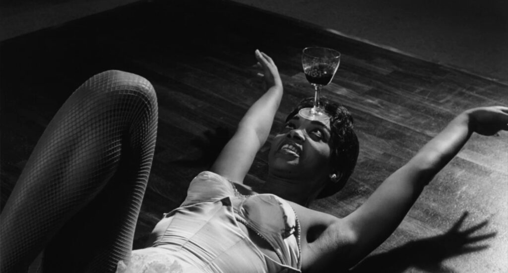 La notte - Michelangelo Antonioni - dancer - nightclub - wine glass - forehead