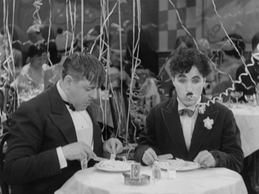 City Lights - Charles Chaplin - Harry Myers - Eccentric Millionaire - Little Tramp - nightclub - spaghetti - streamers